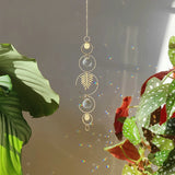 Gaia solfanger i messing med glas og krystaller